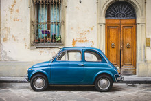 Small Italian Vintage Car Parked In Tuscan Alley