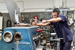 © Bisual Studio/Stocksy - Man working in a metal workshop