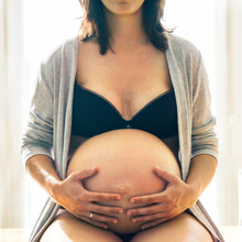 Pregnant Woman Touching Belly