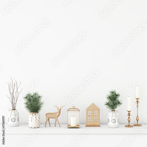 Fotografia, Obraz Empty white wall mock up with pine branches in vases, wooden deer, candles and lantern