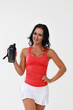 © kot500 - Young woman with protein shake bottle on white background