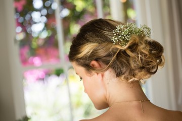 Wall Mural - Close up of bride hair with flowers