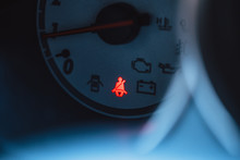 car safety belt or seatbelt red light warning sing show at vehicle gauge