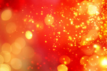 Christmas Abstract Red Lights Background. Festive Xmas Abstract Background With Bokeh Defocused Lights And Stars. Card Or Invitation For Your Design.
