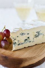 Wall Mural - Blue cheese  with fresh grapes