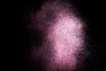 Wall Mural - dust explosion on a black background for graphic resources.