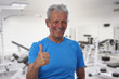 © dream@do - Active , fit, senior man in gym. Happy smiling elderly man showing thumbs up after wokrout. Sport, recreation, healthy senior lifestyle