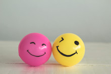 Self Made Hand Drawn Smiley Face On Yellow And Pink Ball