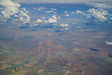 Fototapeta Do pokoju - Aerial view of landscape, view from window seat in an airplane