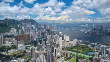 Wall Mural - 4k aerial hyperlapse video of Victoria Harbour in Hong Kong