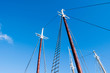 sailboat masts against sky