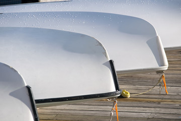 sailboat hulls drying in sun