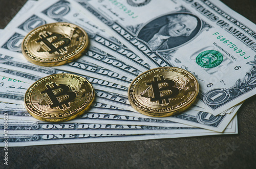 Golden Bitcoin Coins On A Paper Dollars Money And Dark - 