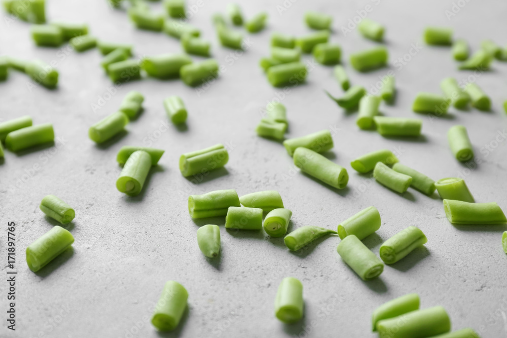 Fresh green beans on light background