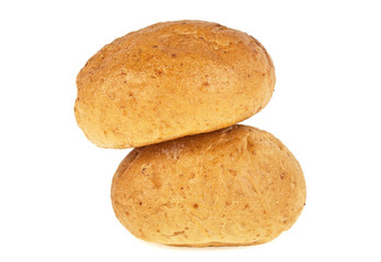 Two fresh baked buns on a white background