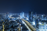 Fototapeta Miasto - Tel Aviv Skyline At Night, Skyscraper and Ayalon Freeway - Toned In Blue