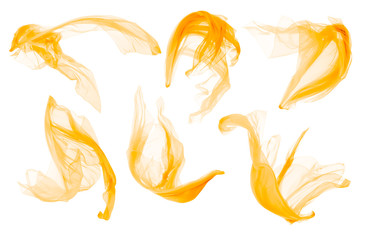Wall Mural - Fabric Cloth Flowing on Wind, Flying Blowing Yellow Silk, Isolated over White Background