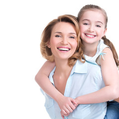 Wall Mural - Closeup portrait of happy mother and young daughter