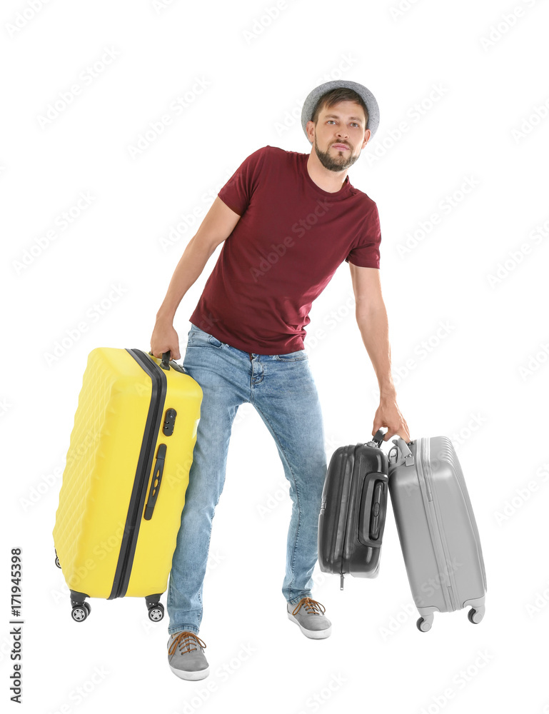 Man with overweight luggage, isolated on white