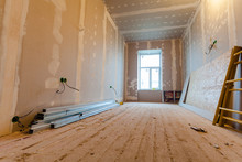 Material For Repairs In An Apartment Is Under Construction, Remodeling, Rebuilding And Renovation. Making Walls From Gypsum Plasterboard Or Drywall.