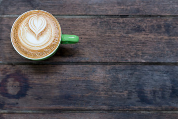 Wall Mural - hot coffee on wood table