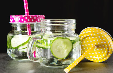 Wall Mural - Refreshing cucumber cocktail, lemonade, detox water in a glasses.