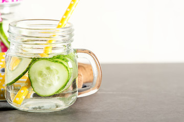 Wall Mural - Refreshing cucumber cocktail, lemonade, detox water in a glasses.