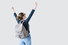 Happy Student With Arms Raised On Air