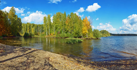 Wall Mural - autumn landscape colorful deciduous forests on the banks of rivers, lakes.