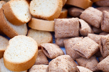 Poster - Many closeup bread chucks crackers,  breakfast concept, kitchen background, healthy eating concept