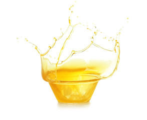 Wall Mural - Cooking oil splashing from bowl, isolated on white