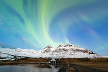 The Northern Light,  Aurora Borealis Over Kirkjufellfoss Before Sunrise, Iceland.