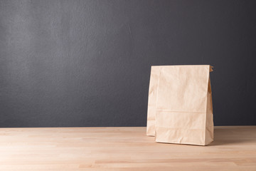 simple brown paper bag for lunch or food on table