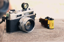 Retro Vintage Classic Camera Film On Wood Background