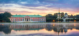 Panorama of Kuskovo estate with reflection in water on sunrise in Moscow, Russia