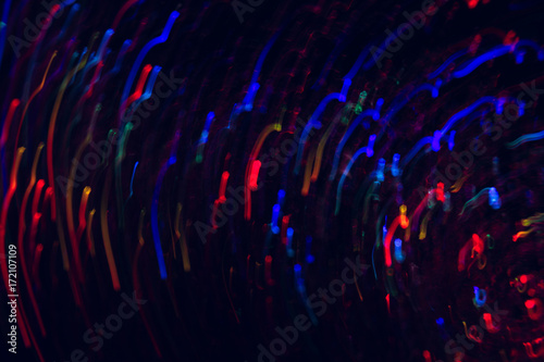 Abstract Picture Of Colorful Lines In Motion On Black Background