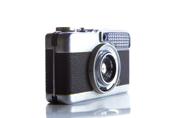 Old rangefinder vintage camera on white background