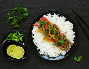 Wall Mural - Stir fry with sage and pepper, with rice.