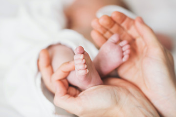 close-up newborn baby feet.