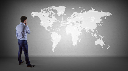 Poster - Businessman using digital planet earth interface on a wall 3D rendering