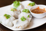 Fototapeta Tulipany - Rice noodle roll.vietnamese food, whit sauce in white plate