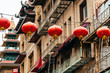 chinese lanterns and fire escape stairs at background
