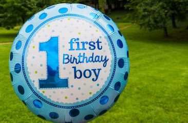 first birthday boy text on ballon