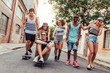 © Jacob Lund/Stocksy - Young skaters hanging out