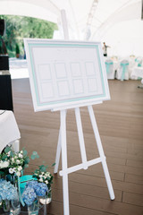 Wall Mural - White board with cards for guests' names