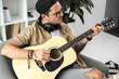 © LIGHTFIELD STUDIOS - man playing guitar