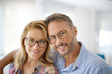 Portrait Of Mature Couple Wearing Eyeglasses