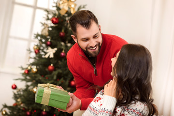 Wall Mural - couple with christmas present