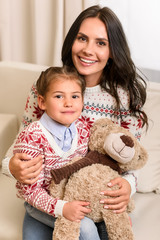 Wall Mural - mother and daughter with teddy bear