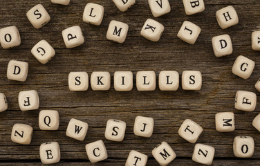 Aufkleber - Word SKILLS written on wood block